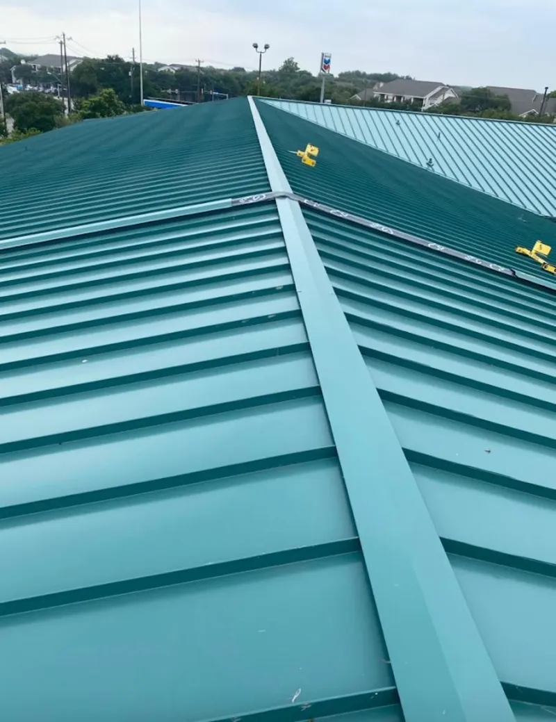 Green commercial metal roof ridge and valley for Metal Roof Repair in Grand Island